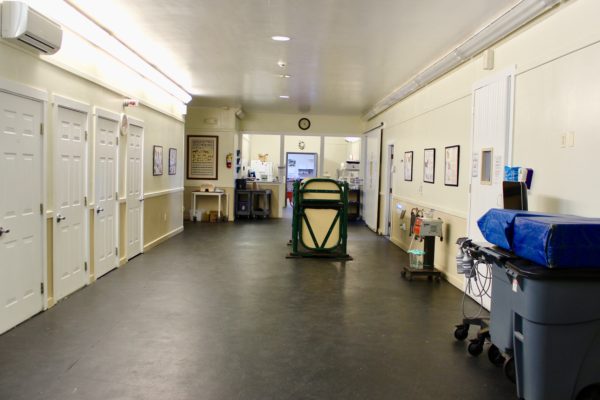 Aisle- Center aisle looking toward the pharmacy with stocks for gastroscopies and other procedures